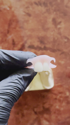 Removable denture video the clear guard. how to put a denture into the mouth.